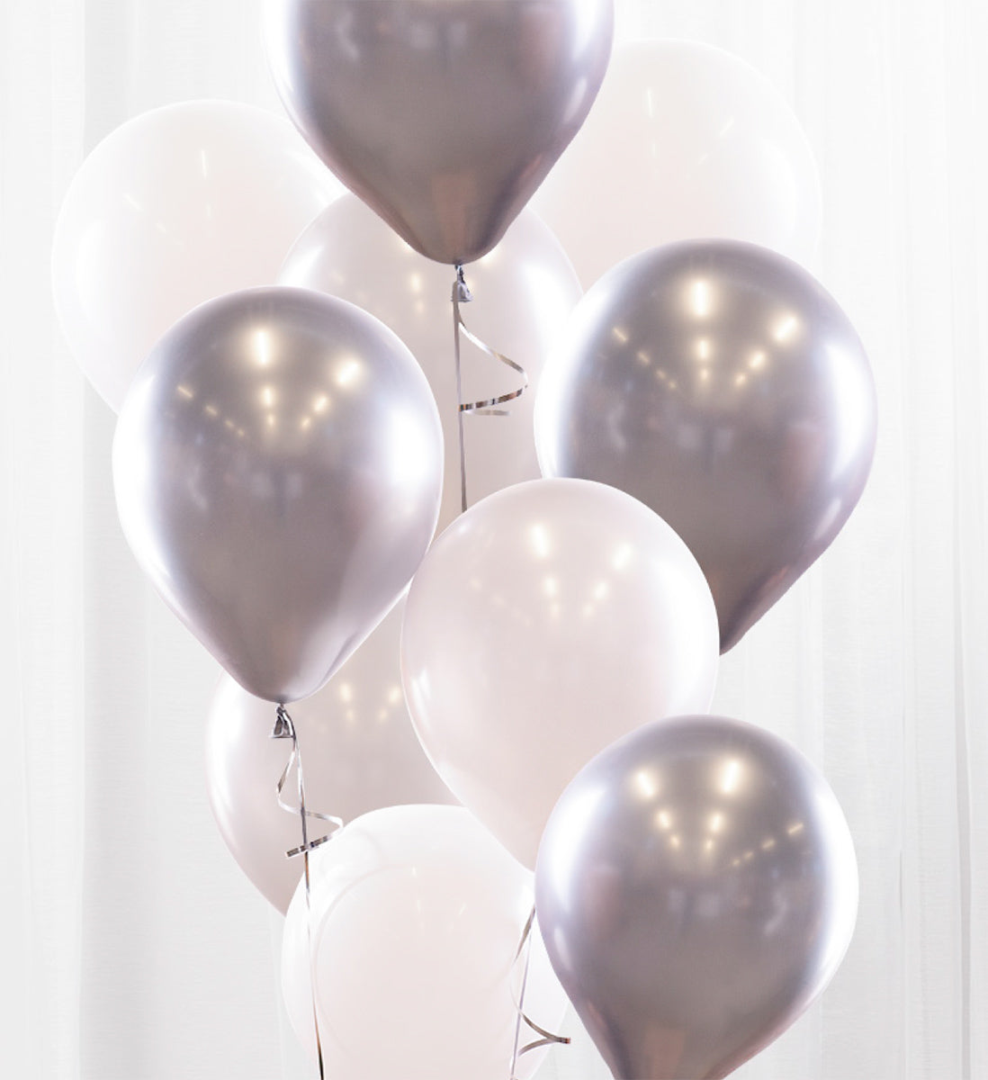 10st heliumfyllda ballonger i silver och vitt