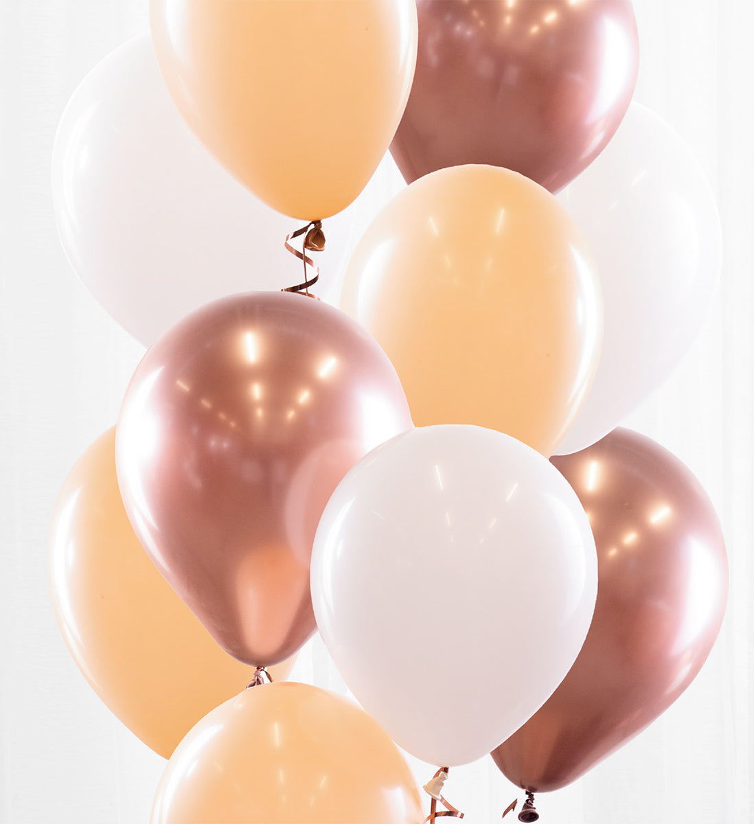 10st heliumfyllda ballonger i blush, vit och roseguld